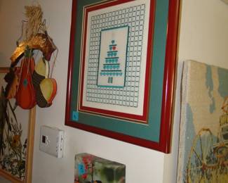 Framed and matted crossed stitched piece