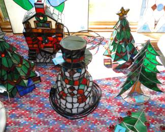 Real stained glass Holiday pieces, mixes perfectly with the those Santa's that we have for sale, at 50% off