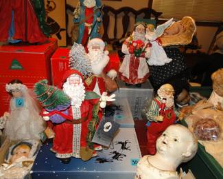 Santa's and scary doll in front