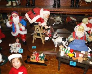 Santa's and more, and a Gilligan Island Beyers Choice Caroler, in the front