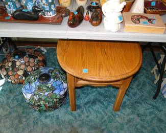 Two stained glass lampshades, and an oval side table, you just have to be reminded, to look up and down, especially under tables too, where treasure lurks