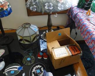 More sun catchers, and stained glass lamps, also we have a very nice painted glass lamp too