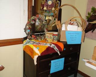 Yes, despite the signs and all the other items, that wonderful dresser is for sale, and complete with mirror, and this piece also qualifies for 50% off