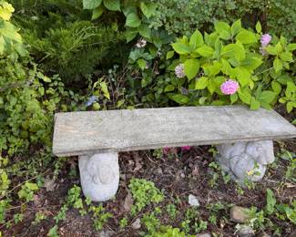 Substantial cement rabbit bench