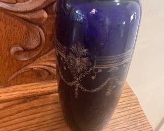 Cobalt blue glass vase with floral design