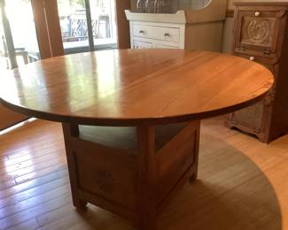 Pine kitchen/ pub table. Spoon carved base , carved under the table top. Storage