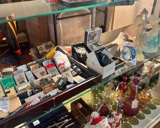 Lighters, Perfume Bottles, Nesting Dolls,