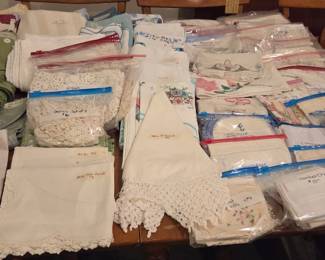 Vintage table cloths, crochet doilies, hand-embroidered furniture scarves, pillowcases, handkerchiefs, curtains