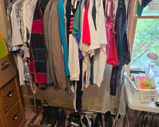 Clothes, including men's shirts, T-Shirts, and Blazers. Not pictured, a handful of men's and women's coats. 