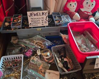 Jewelry, including necklaces, bracelets, earrings, rings, pins, cuff links, and tie pins. 