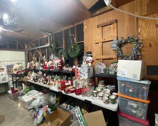 Packed garage filled with vintage holiday including Christmas and fall