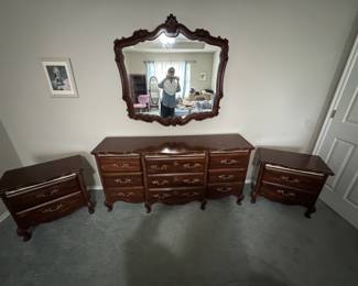 Wood Dresser with mirror, chest of drawers (see other photo), and two nightstands. Dresser 9 drawers, chest 5 drawers, 2 nightstands (2 drawers ea.) wood cherry finish with gold