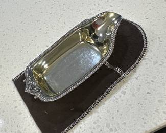 Sterling invalid feeder.  Mrs King collected mostly porcelain or ceramic invalid feeders.  You will see her collection in the next two pictures.  We hope to get them all out on a shelf so you can see them all better.  