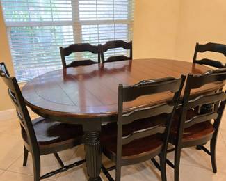 Table with 8 chairs. Shown without 20” leaves x 2.