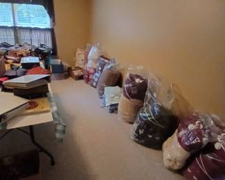 Lots of Clean Comforters, Pillows, Blankets.