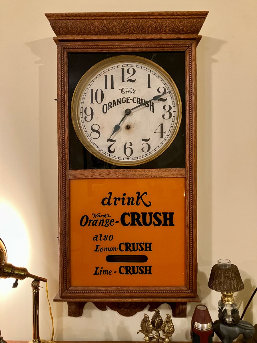 Early 20th century Wards Orange Crush reverse painted clock manufactured by Ingraham