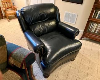 Navy leather club chair by Whittemore Sherrill