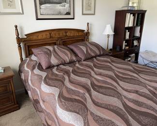 Queen sized bed with wooden headboard. Asking 150.00