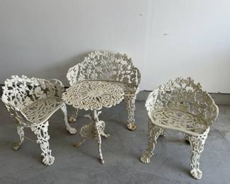 Vintage wrought iron table and chairs. Asking 300.00.
