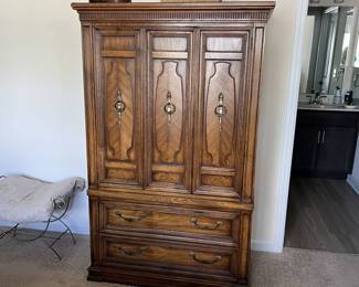 Wooden armoire. Very spacious. 38”w x 64” in height. Asking 300.00
