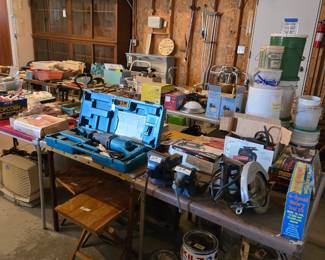 Garage filled with Tools & Equipment:  SkilSaw; Recipro Saw; Vises and much more!!