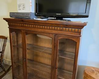 Panasonic HDTV; Top Half of China Cabinet Used as a Bookcase; 