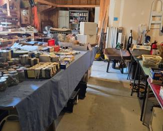 Garage filled with Tools & Equipment:  Wheelbarrow; Task Lighting; Boxes & Jars of Screws, Nuts, Nails and much more!!