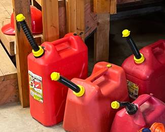 Detached garage full of tools, gas cans, hoses, gardening supplies, yard art, and more!