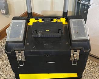 Portable tool box on wheels with extendable handle