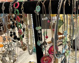 Tons of jewelry pieces… necklaces, bracelets, and earrings all priced to sell