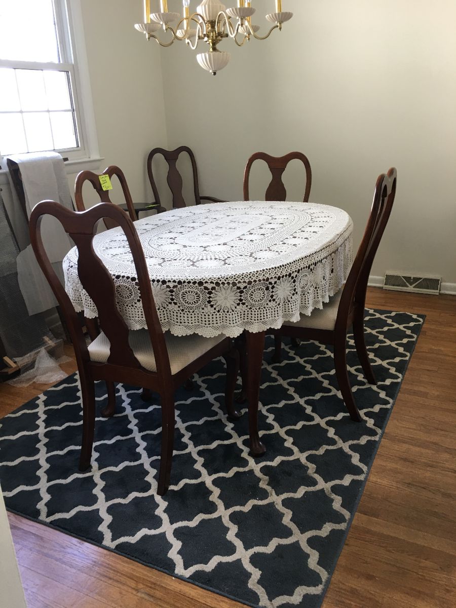 Cherry finish Dining Table and six chairs comes with pads and 2 leafs