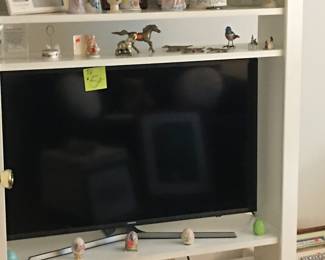 Tv
Tv stand 
Ceramic bells 