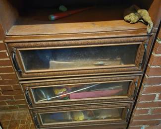 Unusual 3 door cabinet.