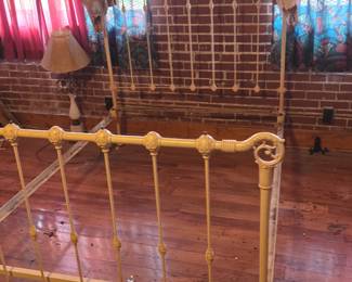 Full size iron bed.