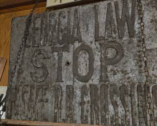 Large solid iron Early Railroad crossing sign. Georgia