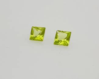 Two (2) peridot 4mm square cut gemstones. 0.71 gtw.