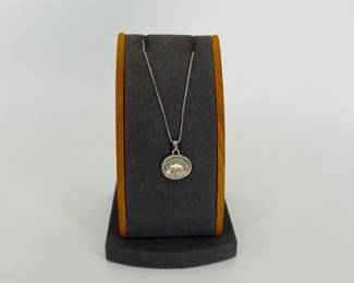Silver 20" box chain with delicate "grandma" 1/2" charm. Made by Jeep Collins. Both marked 925. 5.03 gtw.