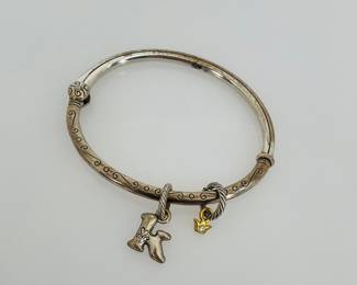 Brighton silver tone bangle bracelet with (2) charms - a K and a small crown with rhinestone center.