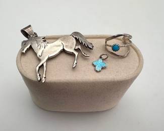 Sterling Silver Horse Pendant with butterfly charm and toe ring. All pieces stamped "sterling". 11.61 gtw.