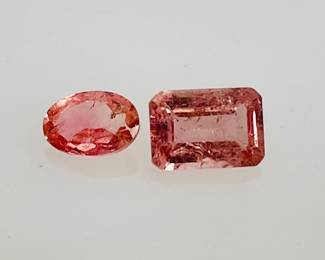 Two (2) pink tourmaline gemstones: (1) oval cut and (1) emerald cut. 1.5 ctw.