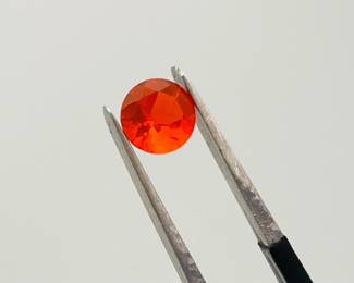 Cherry Opal 5mm Round Cut Gemstone. 0.30 ctw.