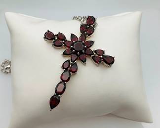 Sterling silver 2 1/4" cross pendant full of red tourmaline stones. 17" sterling silver chain. 20 gtw.