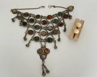 Silver tone apron necklace with natural agate stones including green chalcedony and carnelian. Cream colored vintage resin screw back clip on earrings.