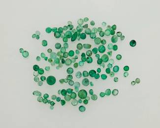 Assortment of mixed sizes of round cut emerald gemstones. 5.0 ctw.