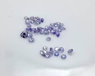 Assorted tanzanite gemstones. Various sizes and shapes. 3.10 ctw.