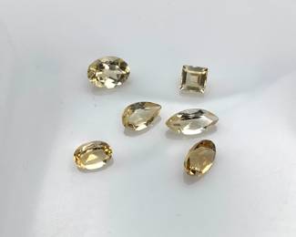 Assorted citrine gemstones. Various shapes and sizes. 5.25 ctw.