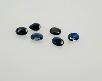 Six (6) dark blue spinel gemstones. Mixed shapes and sizes. 3.85 ctw.