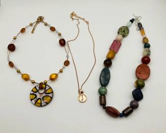 Art glass yellow and brown 18" necklace. 18" natural stone necklace featuring agate, serpentine, rhyolite and more.