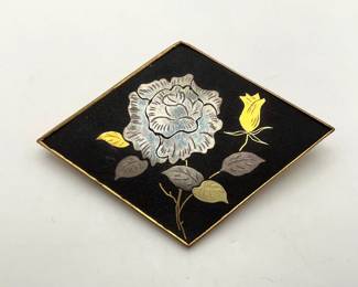 Vintage 2" damascene brooch with inlay floral design.