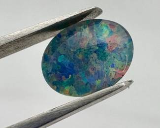 Oval cut opal cabochon. 0.19 ctw.